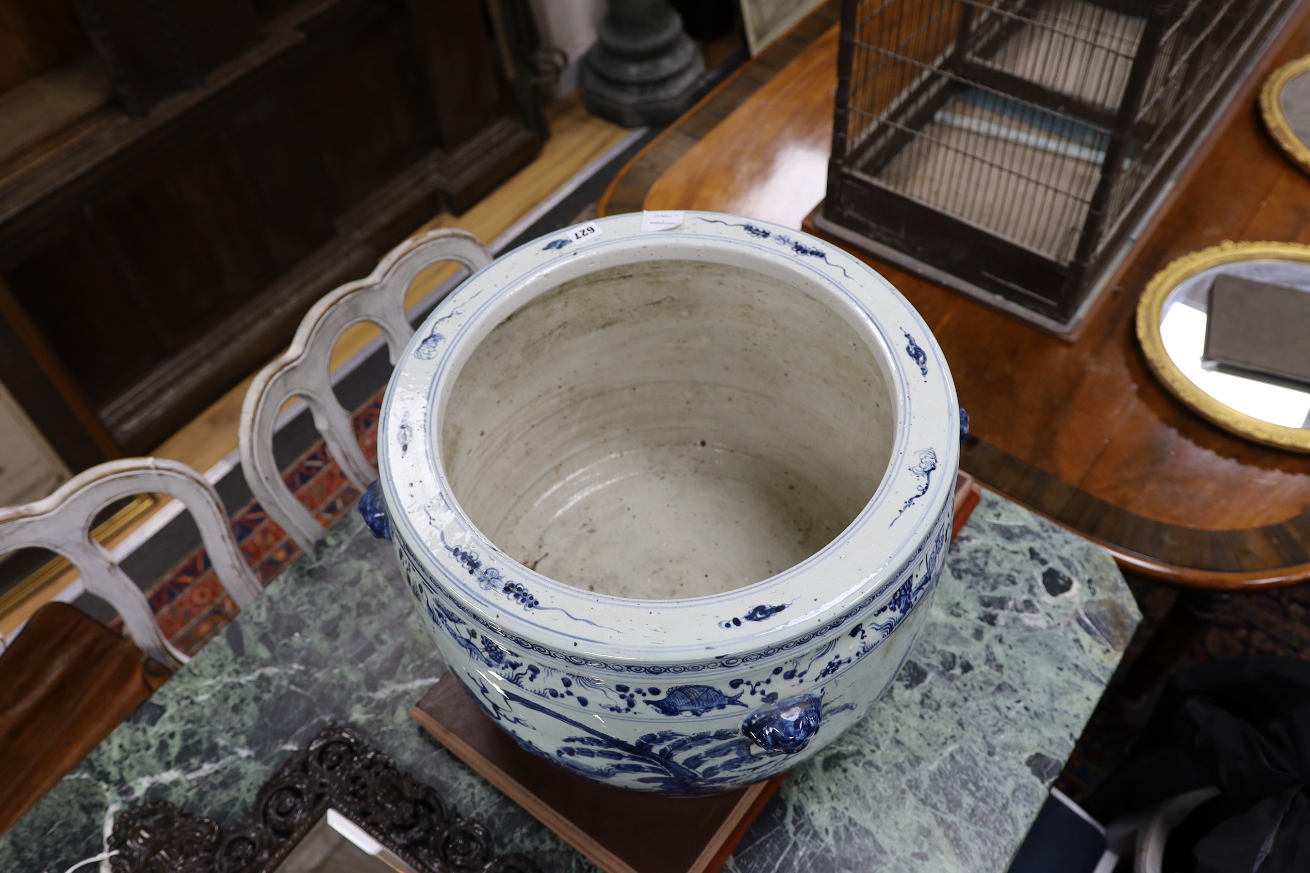 A large Chinese blue and white fish bowl. 39cm high